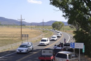 The first of 19 hearses carrying the bodies of the Granite Mountain Hotshots passes through Peeples Valley, AZ.